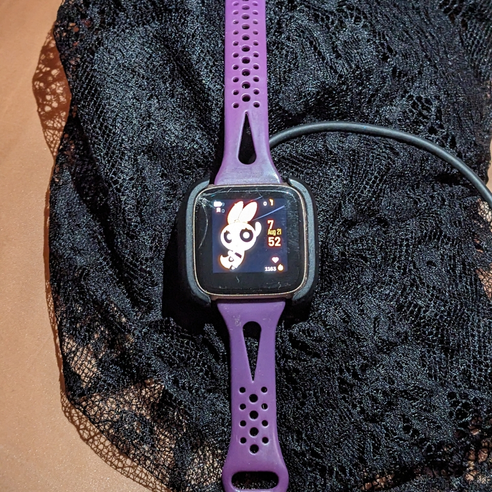 Versa Smartwatch with Rose Gold Face and Charger